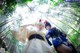 Two women dressed in traditional Japanese clothing posing for a picture.